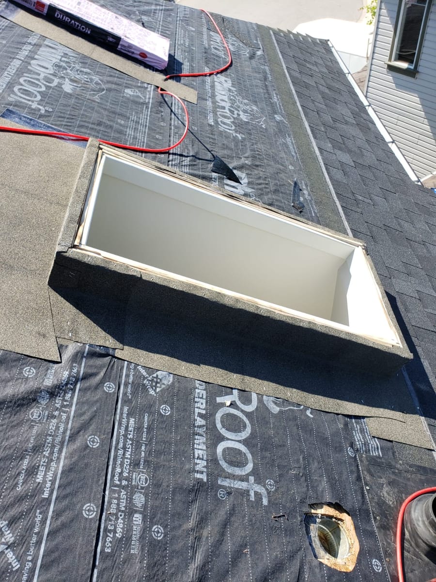 ice water barrier wrap to skylight before installating flashing and shingles