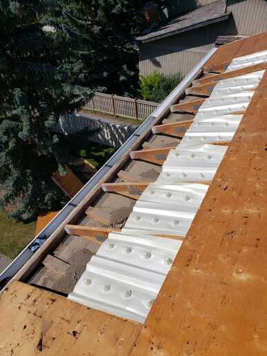 ventilation improvement to low pitch non vented roof area